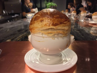 Lobster bisque puff soup with truffle and lobster tail