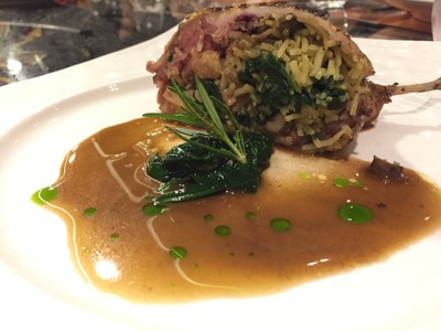 Roasted stuffed French quail with foie gras, wild mushroom, wild rice and quail red wine butter sauce