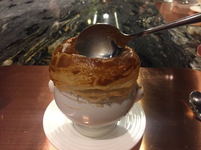 Lobster bisque puff soup with truffle and lobster tail