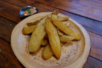 Whole Cuts from the Potato, Double Fried and served with italian spices.