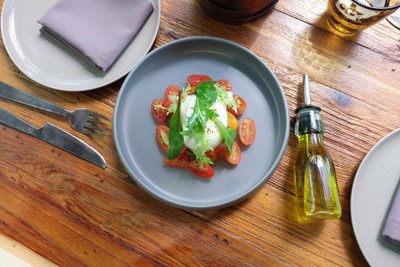 Burrata from Puglia with mixed heirloom tomato and Sicilian extra virgin olive oil