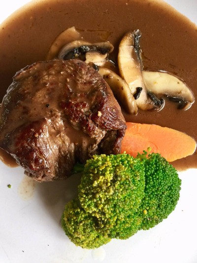 Argentinian Steak sautéed portobello and red wine