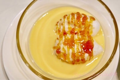 Light Home-made Meringue Floating on Vanilla Sauce