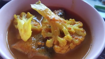 แกงส้มปลากระพงยอดมะพร้าว