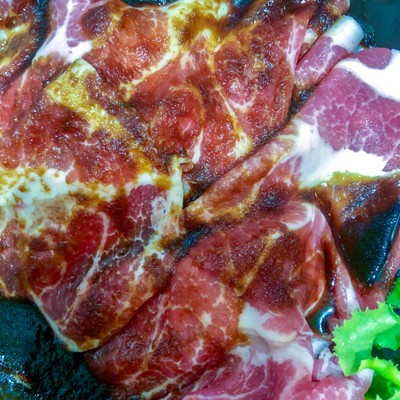 Sliced pork marinated with soy sauce and fruits juice