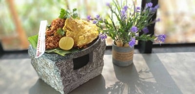 Food &cafe'คลังเตามนุษย์หิน