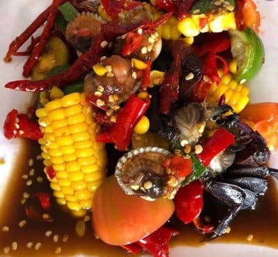 ตำข้าวโพดหอยแคลงปลาร้า