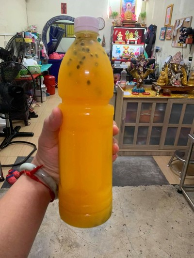 น้ำเสาวรสแท้100%ขวดใหญ่(ผสมเนื้อเยอะ)