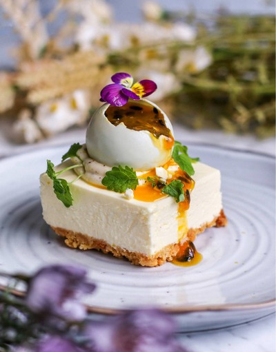 Cheesecake with White Choc Dome, Passionfruit Liquid