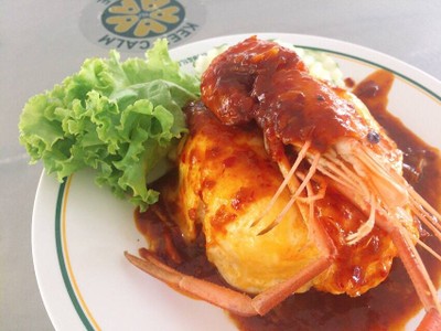 ข้าวไข่ข้นกุ้งราดซอสต้มยำ