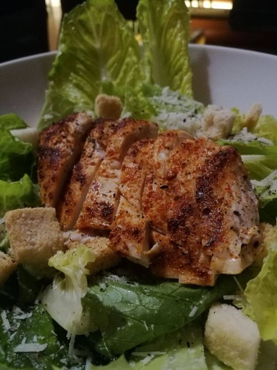 Caesar salad with spicy chicken
