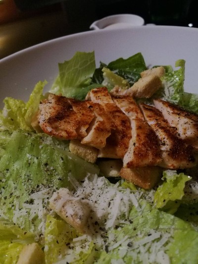 Caesar salad with spicy chicken