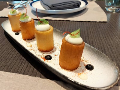 Bravas potatoes, spicy tomato sauce, black garlic aioli