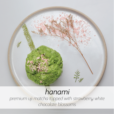 premium uji matcha topped with strawberry white chocolate blossoms