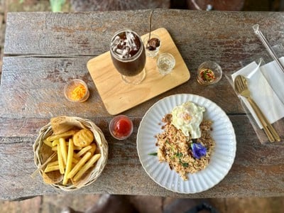 Let Me Tell You Our Story Cafe