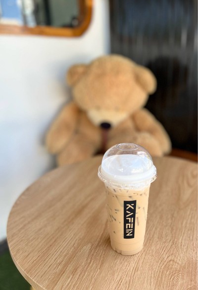 ☕️ Iced Latte. (Price 35 Baht.)