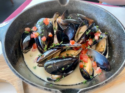 French mussels with shallots , butter and white wine