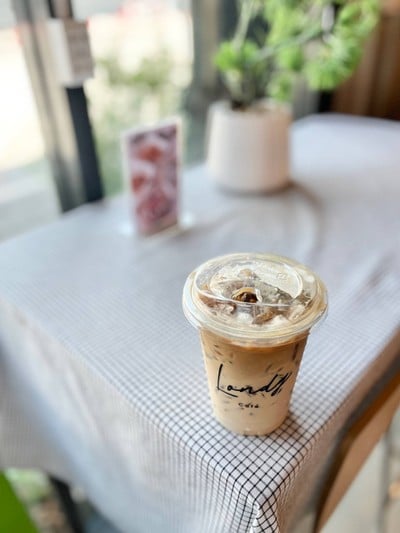 ☕️ Iced Latte. (Price 50 Baht.)