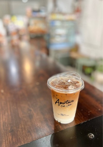 ☕️ Iced Latte. (Price 65 Baht.)