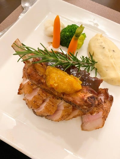 Grilled Pork Chop with Cherry Sauce and Potato Wedges