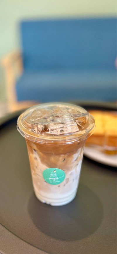 ☕️ Iced Latte. (Price 60 Baht.)