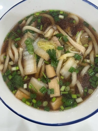 “อุด้งน้ำดำหมูนุ่ม” 