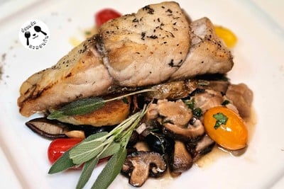 Branzino al Forno con Funghi olive e patate