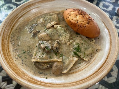 Cheese Ravioli with Truffle Cream Sauce and Champignon Mushroom