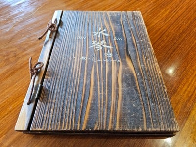 ป้ายราคาหรือสมุดเมนู