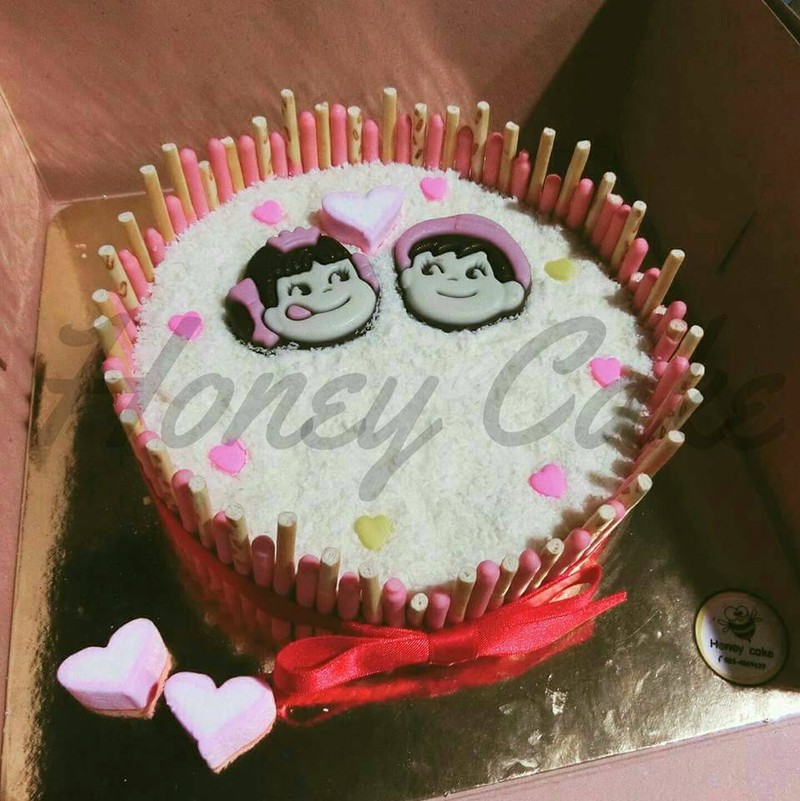 เค้กมะพร้าวอ่อนโรยด้วยไวท์ช็อค