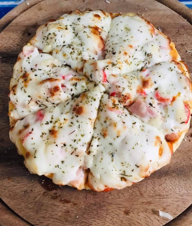 พิซซ่าหน้ารวม โคตรชีสทะลัก 129฿