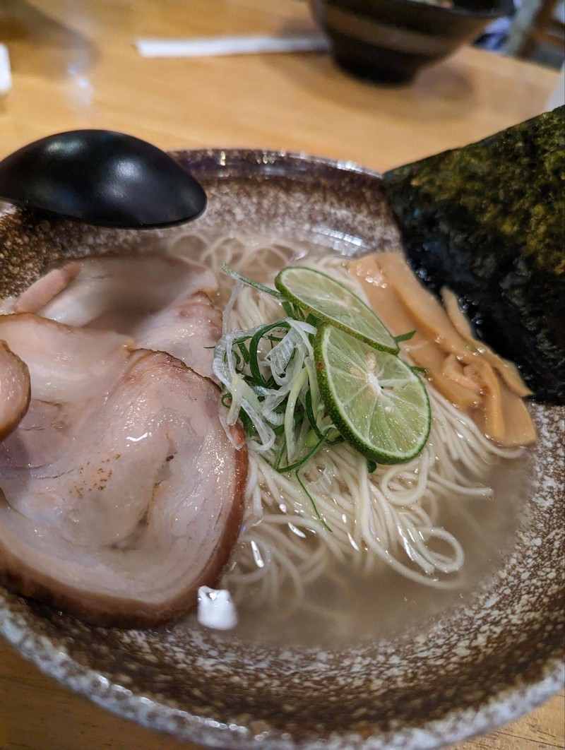 comes with clear broth and slices of lime which brings refres 